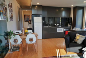 Modern Apartment - Prime Location with Heated Pool